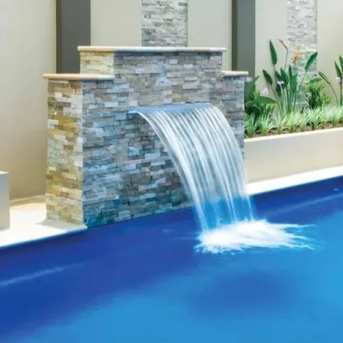 Water cascading over a sheer descent into a pool