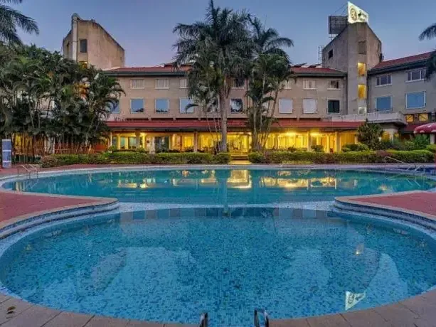 Swimming pool at Ramee Guestline, Bangalore